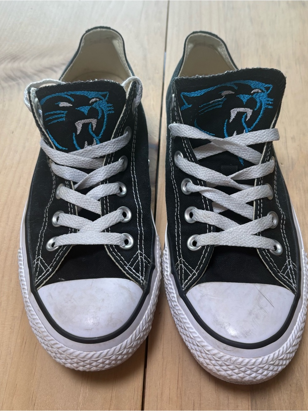 Converse Black Low-Top Sneakers with Carolina panther embroidery